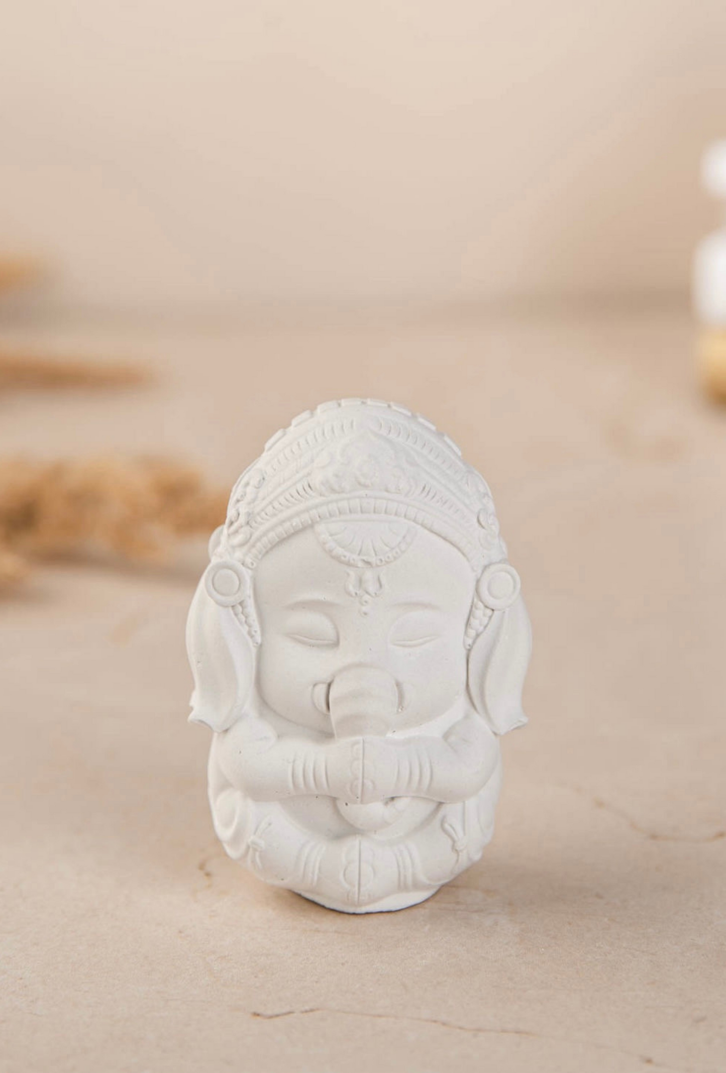 Gypsum handmade figurines of Buddha & Ganesh on incense plate