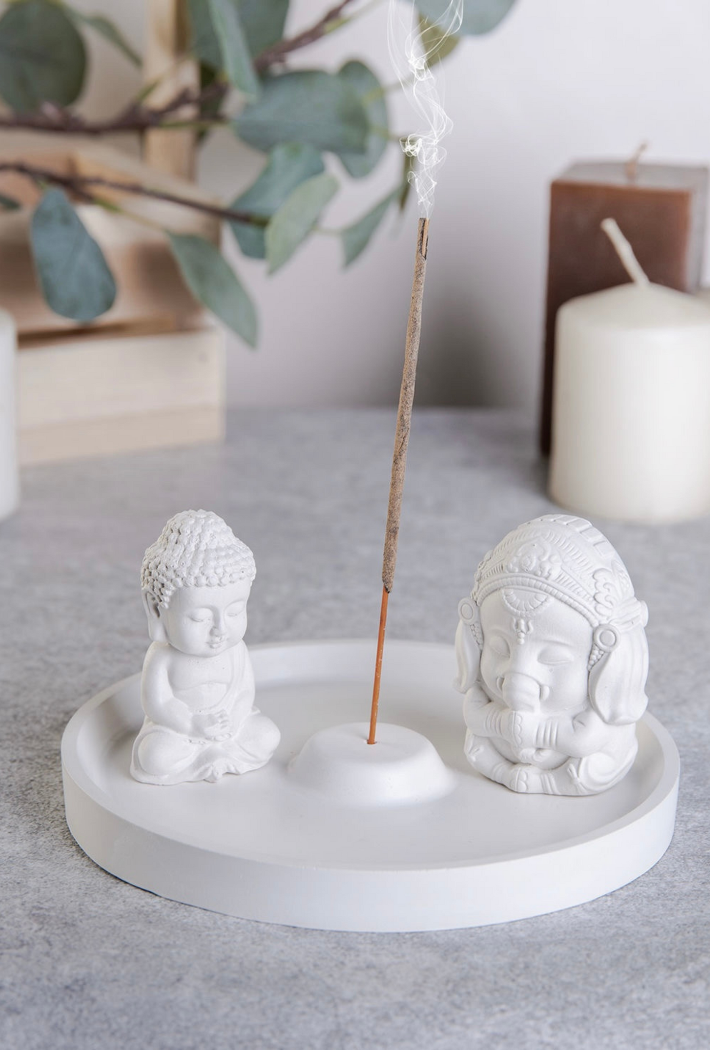 Gypsum handmade figurines of Buddha & Ganesh on incense plate