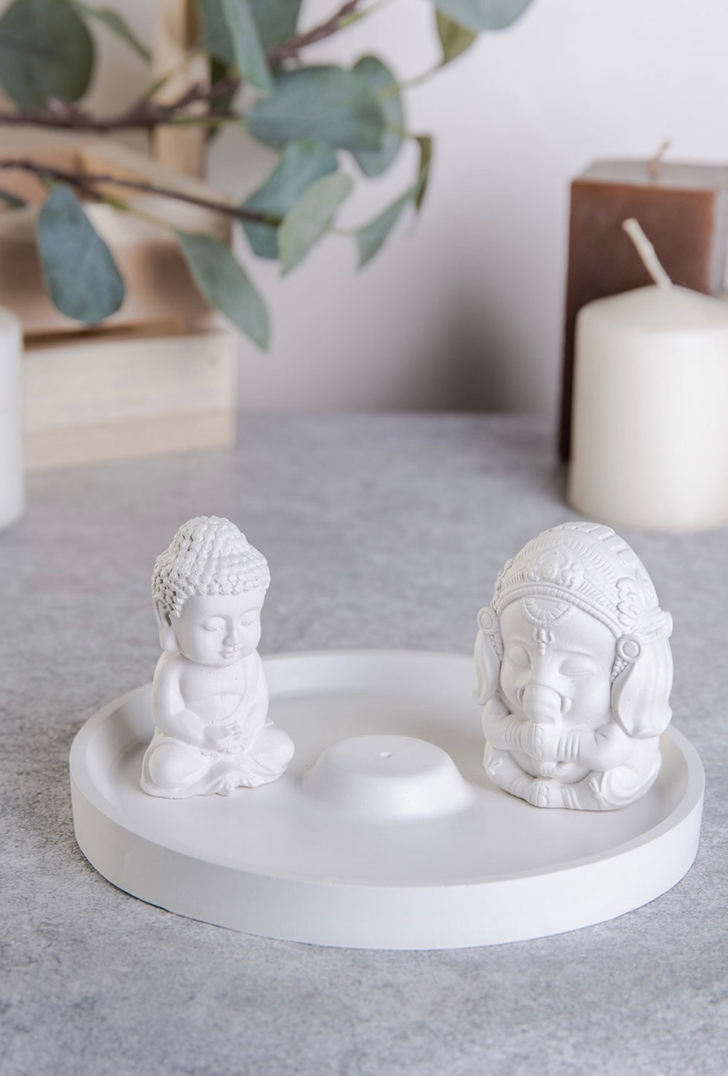 Gypsum handmade figurines of Buddha & Ganesh on incense plate